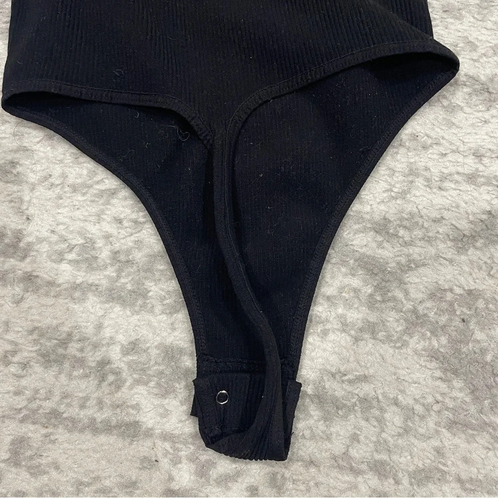 Free People Black V neck Bodysuit